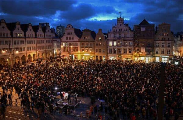 A public square in Germany teeming with protesters. 